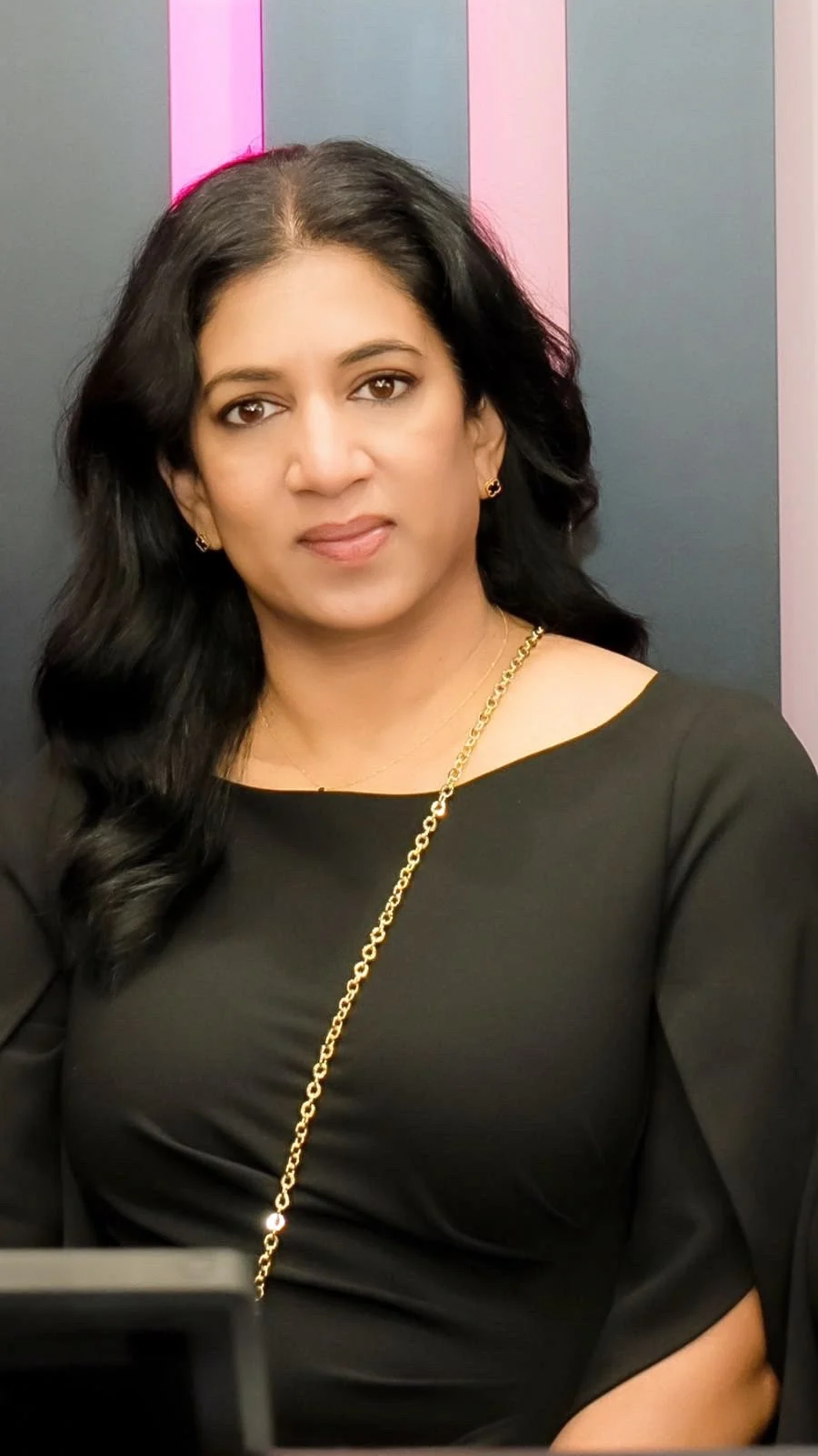 Latha, the artist behind Pure Beauty by Latha, in her Brampton studio